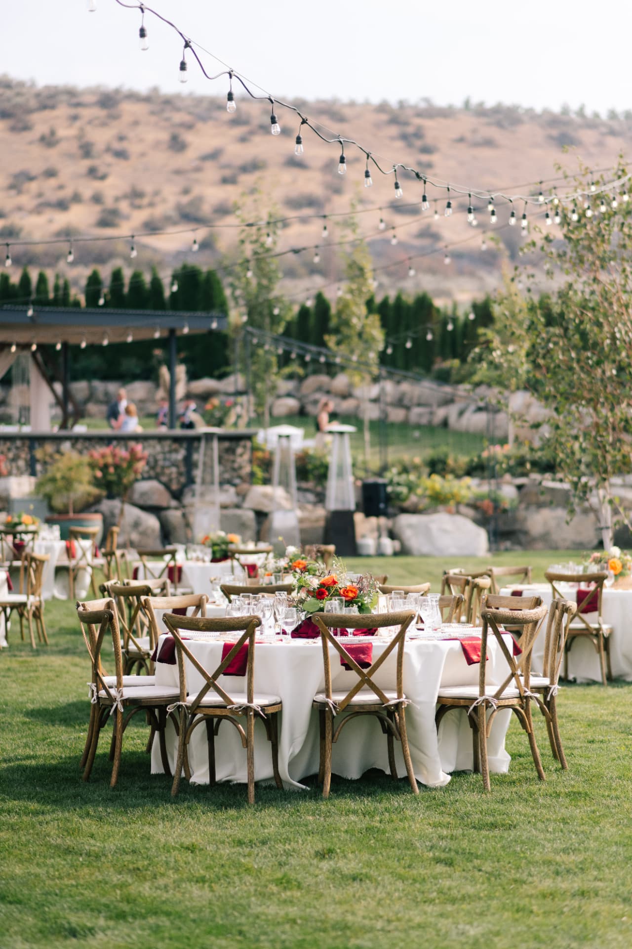 Round table rentals with crossback chair rentals set for a wedding dinner in Eastern Washington