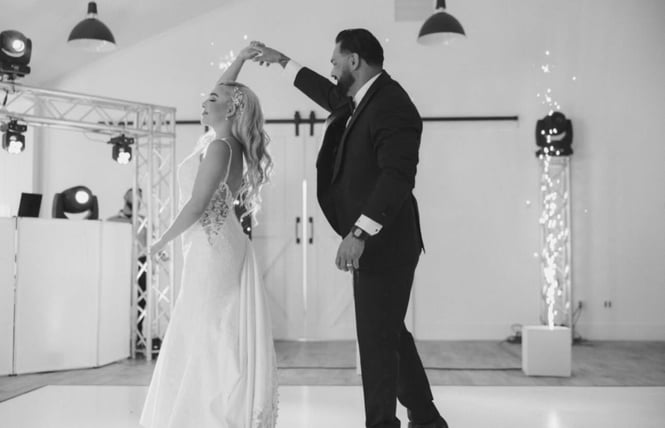 White dance floor lit with sparkler effects at an evening reception — available to rent for weddings and corporate events in Cle Elum and Suncadia, Washington
