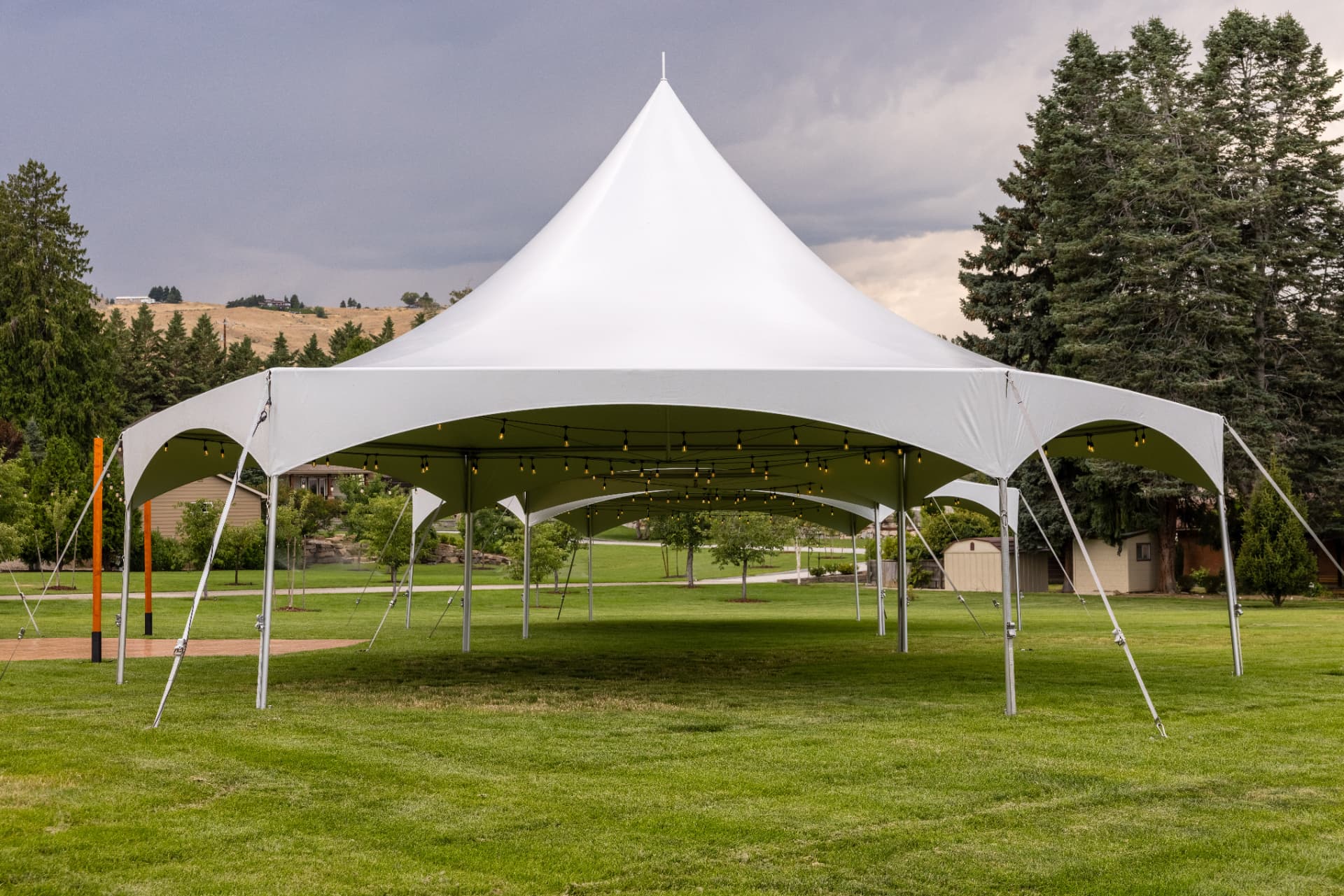 Wedding reception dinner under a pole tent rental in Eastern Washington