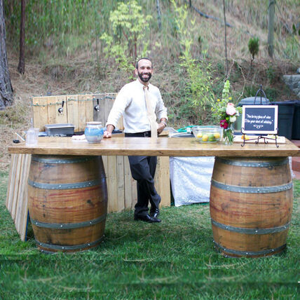 Wine barrel bar with butcher block top — rental item delivered across Eastern Washington by NCW Event Rentals