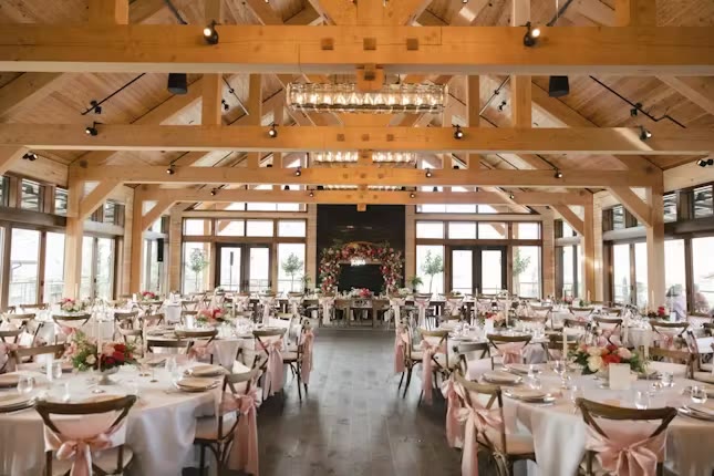 Banquet tables set with linens, china and glassware at an Eastern Washington event