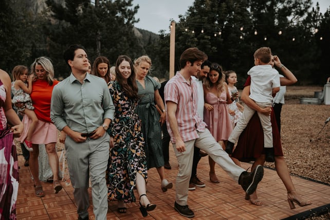 Oak finish portable dance floor installed under a tent — event rental inventory from NCW Event Rentals in Wenatchee, Washington — Oak Dance Floor rental from NCW Event Rentals