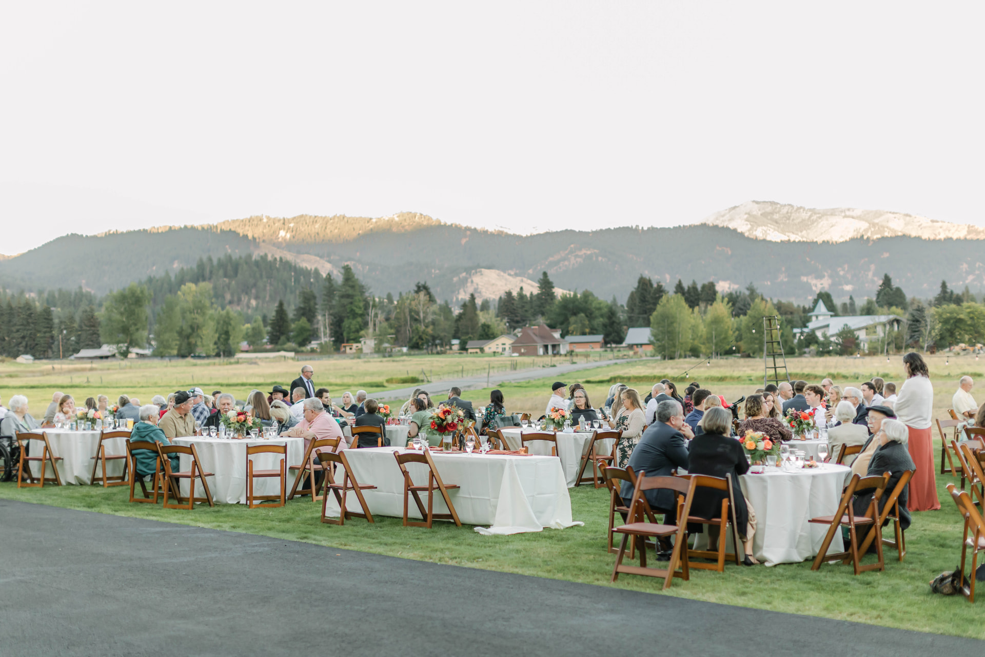 Mountain-view wedding dinner with table and chair rentals in the Cascades of Washington